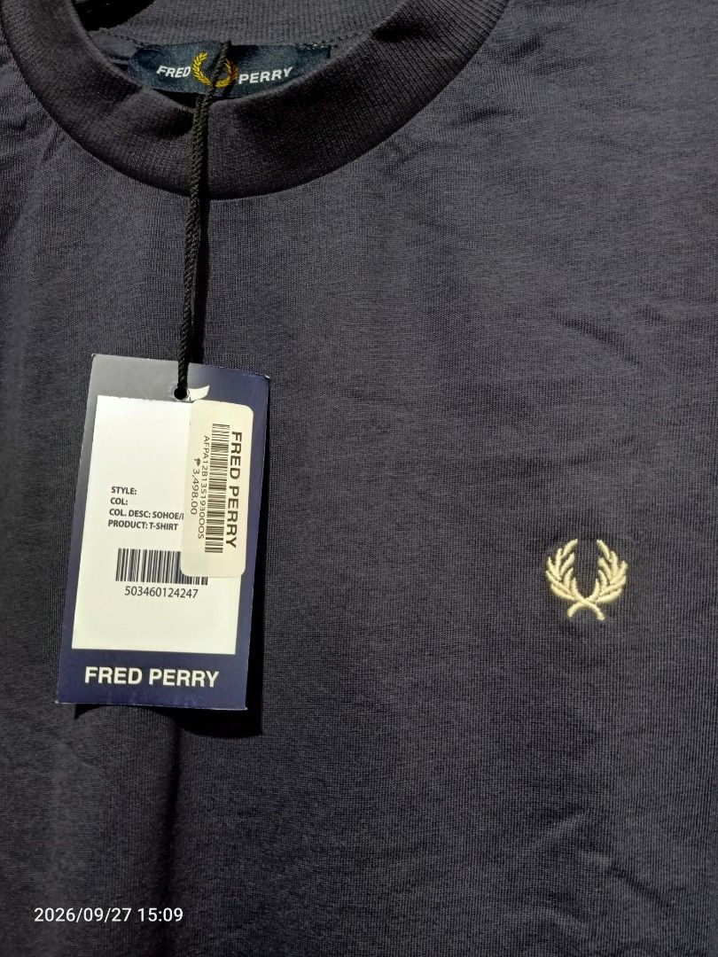 Fred Perry T-Shirt Mens (Category: Tshirts & Polo Shirts ) located in Las Pinas. Submitted by OmengSoyT (Listing ID 1464723396, Image 1). Description: - Brand: Fred Perry - Color: Dark Navy Blue - Size:(M) Medium (Standard size can fit to Large size) - Condition: Brand new with original hang tag - Details: Ribbed mock neck collar, yellow and black striped contrast cuffs, iconic embroidered laurel wreath logo on chest - Quality: Premium fabric wit