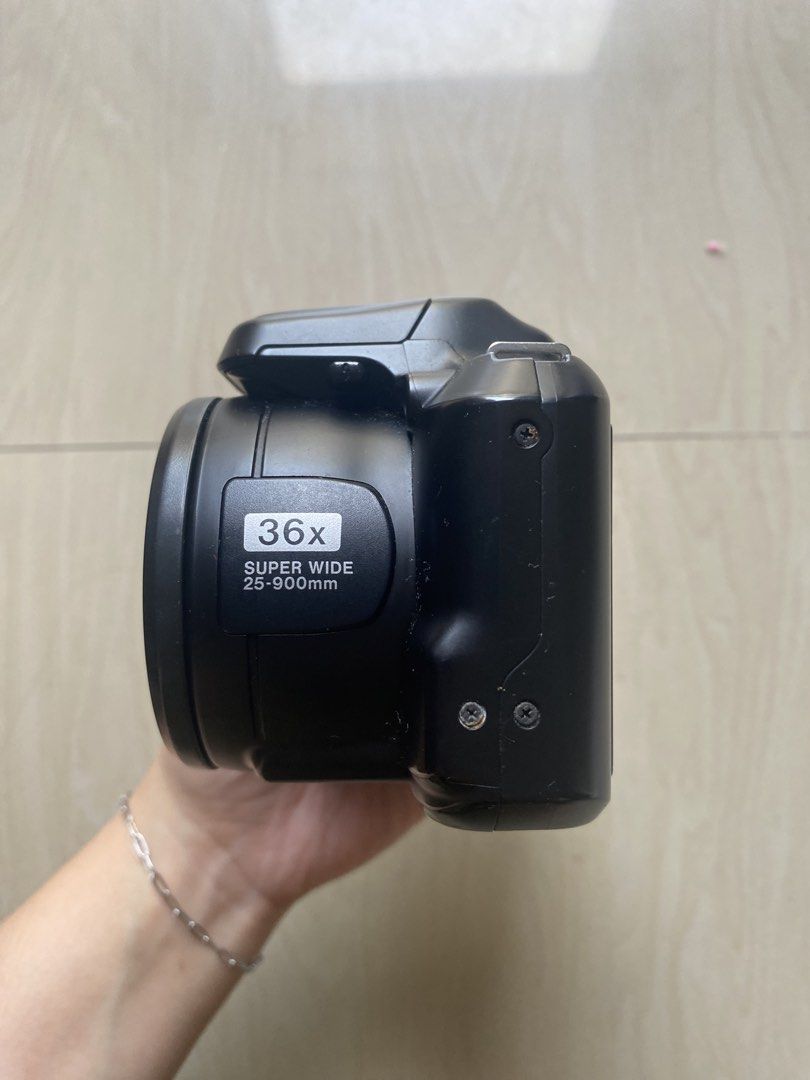 Fujifilm Finepix S8600 (Category: Other Gadgets) located in Cavite. Submitted by tris.preloved (Listing ID 1464636797, Image 3). Description: Fully functional No defect Clear lens no cracks Comes with battery & bag.