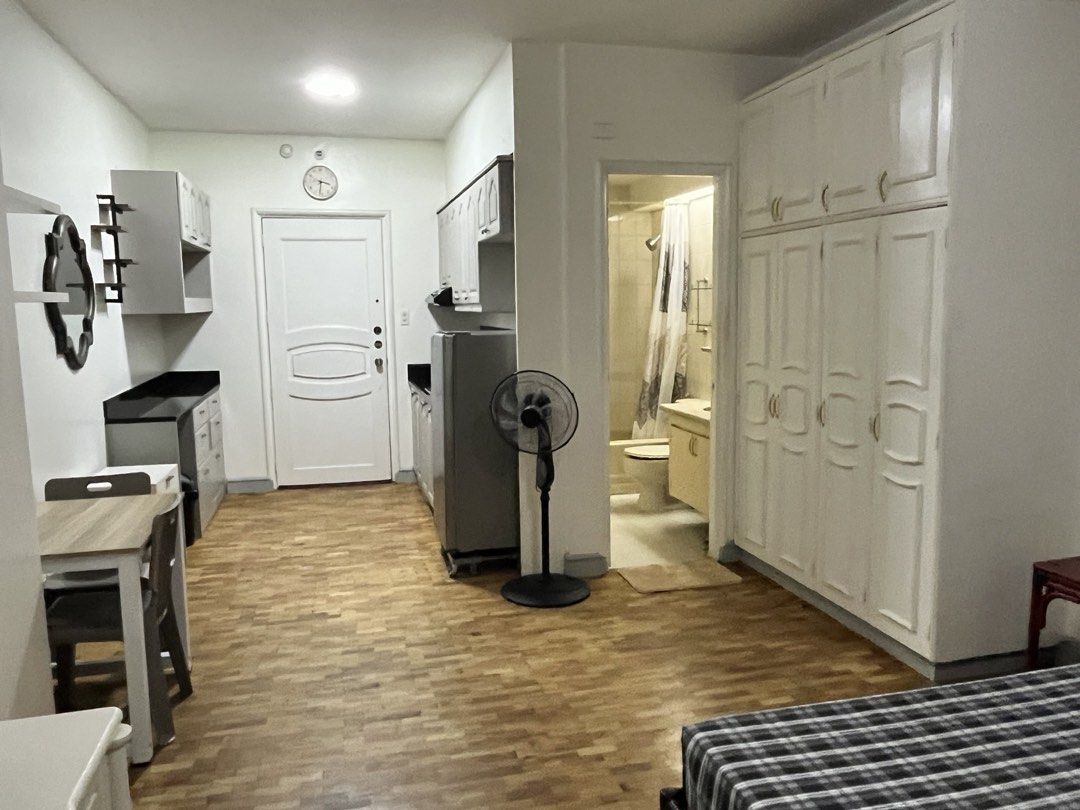 Fully Furnished Studio (Category: Apartments & Condos) located in Makati City. Submitted by misterkinwa (Listing ID 1464646883, Image 2). Description: Save gas while living in the heart of Makati (Salcedo Park area) - spacious studio apartment - Double twin bed - Kitchen & dining - Small workspace - Refrigerator included - split type inverter air conditioning - Ceiling fan - Warm wooden floors - Perfect for singles or couples - Ready for move-in 
