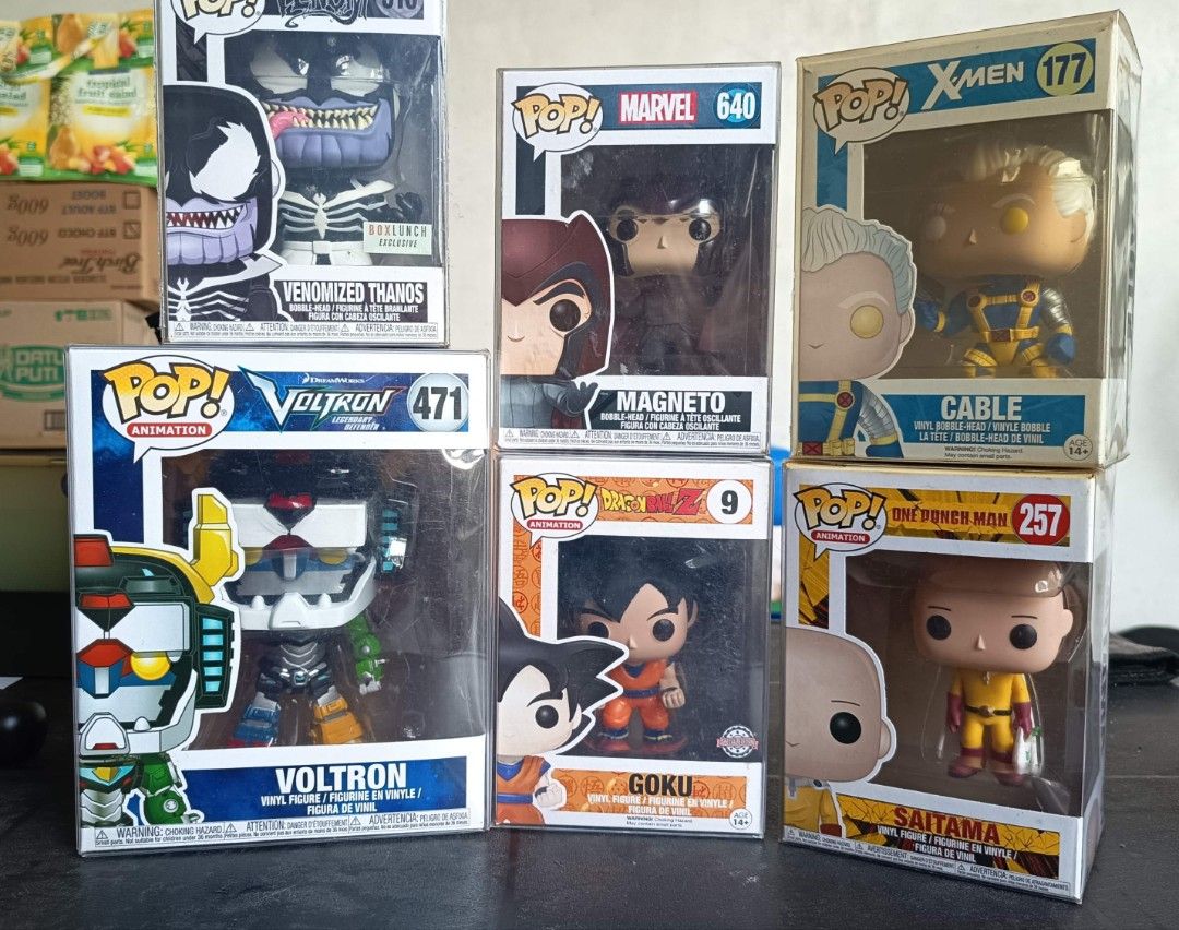 Funko Pop Vinyl Figures Marvel DC Dragon Ball Voltron (Category: Figurines & Statues) located in Cavite. Submitted by mcthrifts (Listing ID 1464768620, Image 1). Description: Funko Pop bundle featuring Venomized Thanos, Magneto, Cable, Voltron, Goku, and Saitama. All include original boxes and were carefully displayed on a shelf. Perfect for pop culture and anime fans! Sold by set Gcash payment, negotiable.