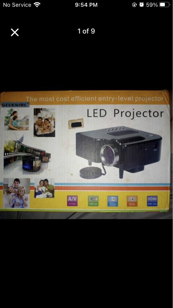 GEEKWIRE LED Projector with AV cables (Category: Projectors) located in Manila. Submitted by yegoo751 (Listing ID 1464721435, Image 1). Description: - Brand: GEEKWIRE entry-level LED projector - Color: Sleek black with compact, space-saving design - Inclusions: Original box, AV to 3.5mm cable, and extra adapters (as seen in photos) - Features: Top-mounted control buttons and manual focus lens - Best For: Budget-friendly home movie nights and casu