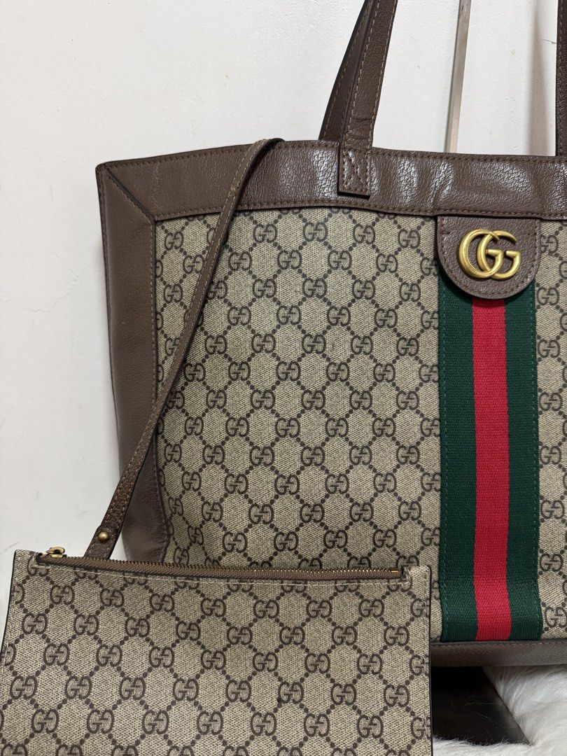 GG OPHIDIA LARGE TOTE BAG (Category: Luxury Bags & Wallets) located in Paranaque City. Submitted by glendalecollection (Listing ID 1464626742, Image 2). Description: - beige - with small pouch - GG Supreme canvas - signature Web stripe.