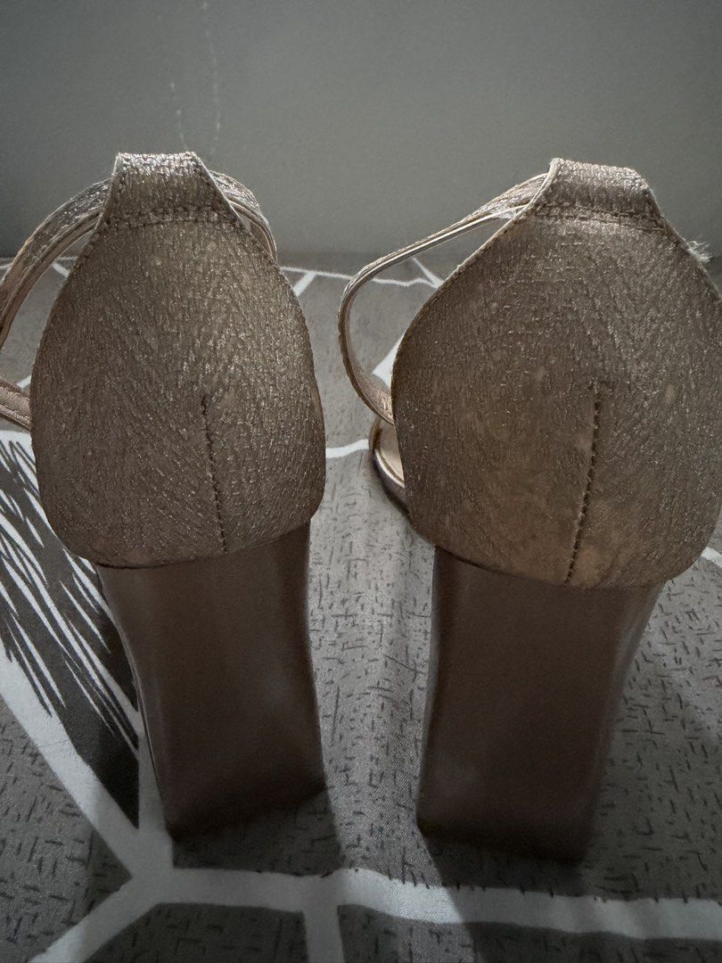 GIBI Rose Gold Block Heels Sandals Size 38 (Category: Heels) located in Tarlac. Submitted by ney14 (Listing ID 1464653903, Image 3). Description: Rose gold block heels from GIBI. Style name is QUINCE. Features an ankle strap and a sparkly band across the toes. The heel is a chunky block style. Size 38. Some scuff marks on the front and soles from wear. Great for dressing up..