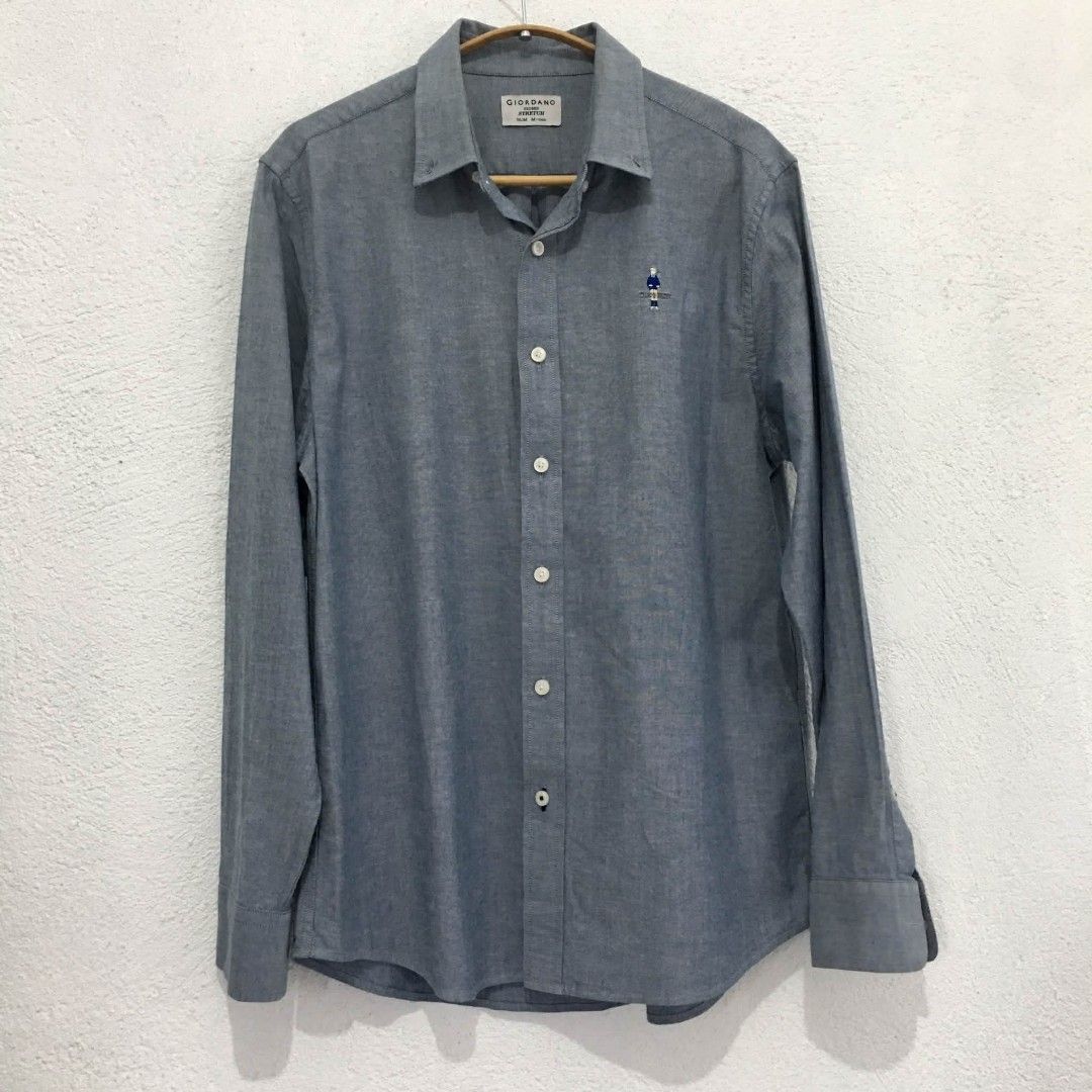 Giordano Classic buttondown shirt (Category: Longsleeves) located in Subic. Submitted by ayvee.ph (Listing ID 1464660198, Image 2). Description: Giordano Classic buttondown shirt So pretty & comfy!!!✨ Prelove & Unisex No when worn 🏷Good as bnew Store bought Size: M on tag Bust: Upto 42 Length: 27 inches Shoulder: 18 📌Measured via tm ✅Color may differ due to lighting Price: 600 📍Location: Olongapo City 🚛Courier: Reg J&T door to door del Mine n