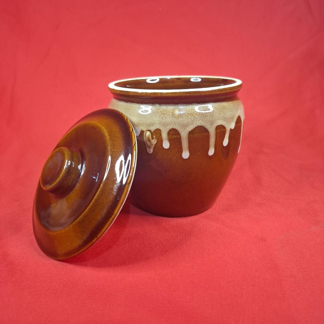 Glazed Ceramic Storage Jar with Lid (Category: Vases & Decorative Bowls) located in Mandaluyong City. Submitted by edward123_andren (Listing ID 1464707304, Image 2). Description: - Brown ceramic jar with matching lid - Stylish white drip glaze design around the top rim - Glossy finish with a smooth interior surface - Convenient small top knob for easy lifting - Handy size, perfect for storing small kitchen items, pantry goods, or trinkets - Solid