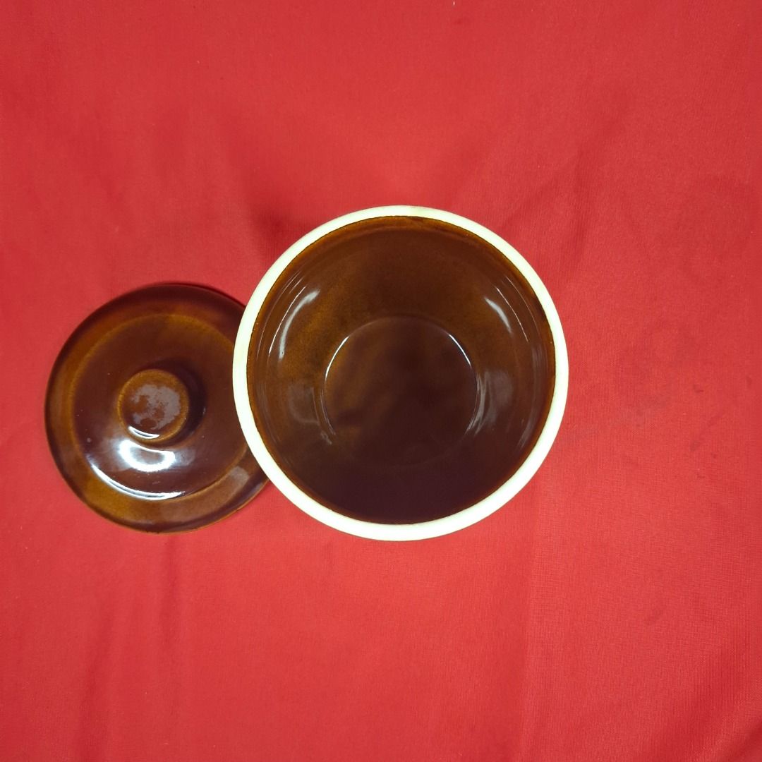 Glazed Ceramic Storage Jar with Lid (Category: Vases & Decorative Bowls) located in Mandaluyong City. Submitted by edward123_andren (Listing ID 1464707304, Image 3). Description: - Brown ceramic jar with matching lid - Stylish white drip glaze design around the top rim - Glossy finish with a smooth interior surface - Convenient small top knob for easy lifting - Handy size, perfect for storing small kitchen items, pantry goods, or trinkets - Solid