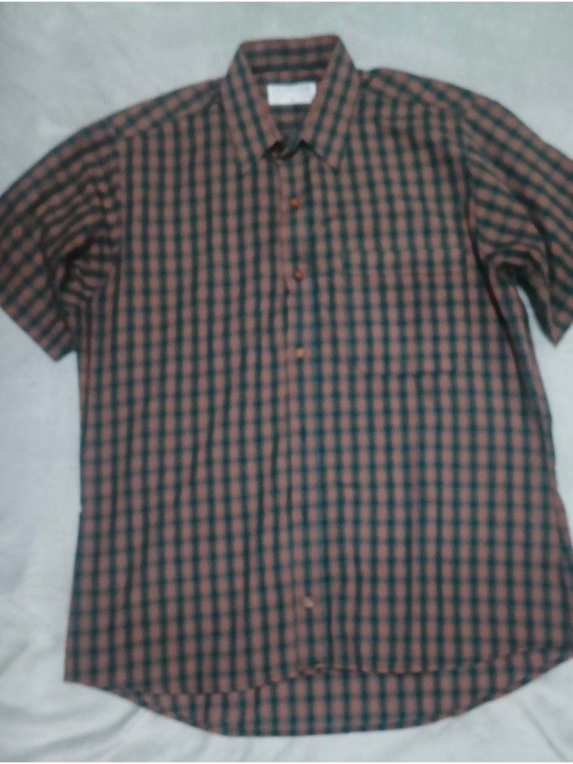 Gloster Short-Sleeve Plaid Button-Down Shirt -Medium #549 (Category: Tshirts & Polo Shirts ) located in Santa Cruz. Submitted by gie_thrift_shop (Listing ID 1464762578, Image 2). Description: Gloster Short-Sleeve Plaid Button-Down Shirt Gloster (Australian Made) Condition: Little sign of usage Size: Medium (M) Pit to Pit: 22.5 inches Length: 27 inches Sleeve Length: 9 inches Material: Polyester Cotton Blend Color: Plaid / Checkered (Terracotta Br