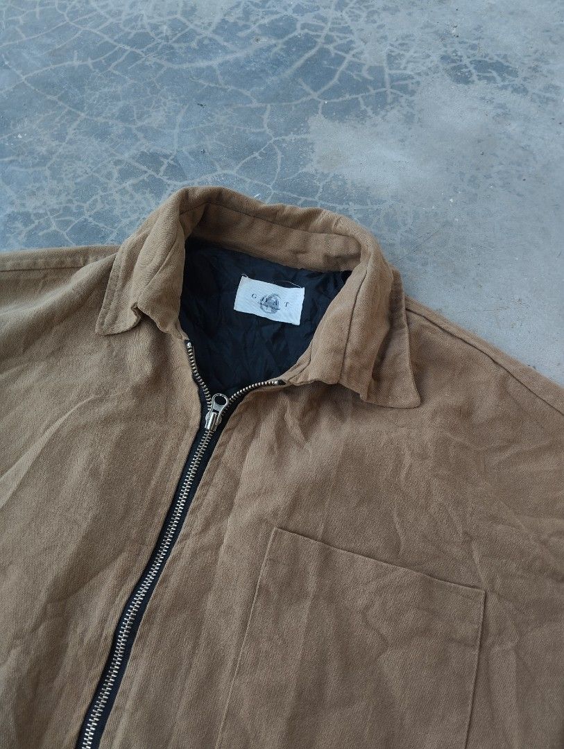 GOAT Brown Zip-Up Jacket (Category: Coats, Jackets and Outerwear) located in Mati. Submitted by old_era.ph (Listing ID 1464583314, Image 2). Description: - GOAT brown zip-up jacket - Chest pocket and two side pockets - Elasticated cuffs and hem - Fully lined interior - Ideal for layering or as light outerwear - Simple and versatile design.
