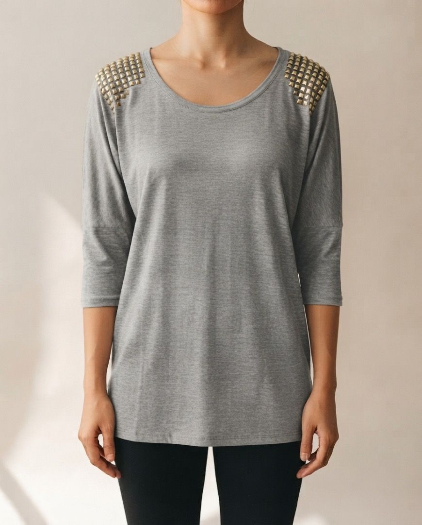 GRAY JERSEY STUDDED TOP BLOUSE (Category: Blouses) located in Marikina City. Submitted by minimalistmanila (Listing ID 1464743770, Image 2). Description: Imported gray jersey top with silver metal accents. Relaxed soft fit. Medium size. Order now! *Blouse is one shade darker in actual - due to lighting .