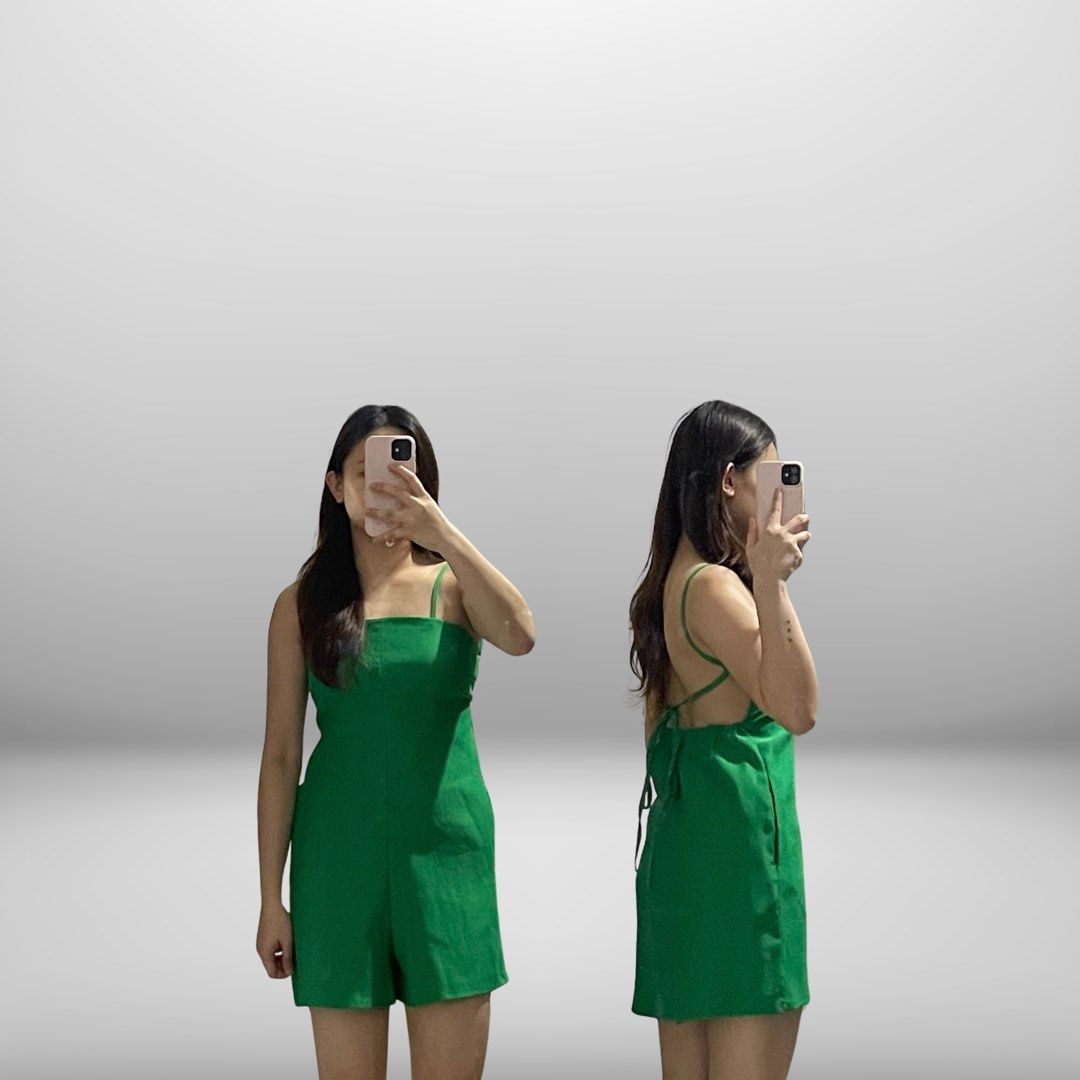 Green Spaghetti Strap Romper (Category: Rompers) located in Angeles City. Submitted by slay.the.day (Listing ID 1464721496, Image 1). Description: - Color: Vibrant green - Style: Casual romper with relaxed-fit shorts - Neckline: Square front with thin straps - Back: Low-cut design with cross straps and adjustable ties - Fit: Relaxed and easy to wear for everyday outfits.