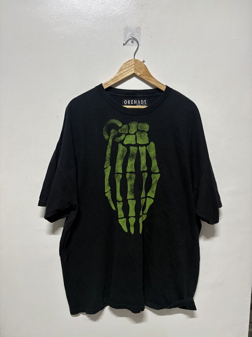 Grenade Skeleton Hand Grenade Graphic T-Shirt (Category: Tshirts & Polo Shirts ) located in Manila. Submitted by skeletal_v2 (Listing ID 1464719869, Image 1). Description: GRENADE (JESSE PINKMAN) 3500+SF 26/31 GOOD CONDITION COLOR RATE 9/10 - Brand: Grenade - Size: XXL (Relaxed fit) - Color: Black with green skeleton hand grenade graphic - Pop Culture: Famous piece worn by Jesse Pinkman in Breaking Bad - Condition: Minor fading on fabric, graphic