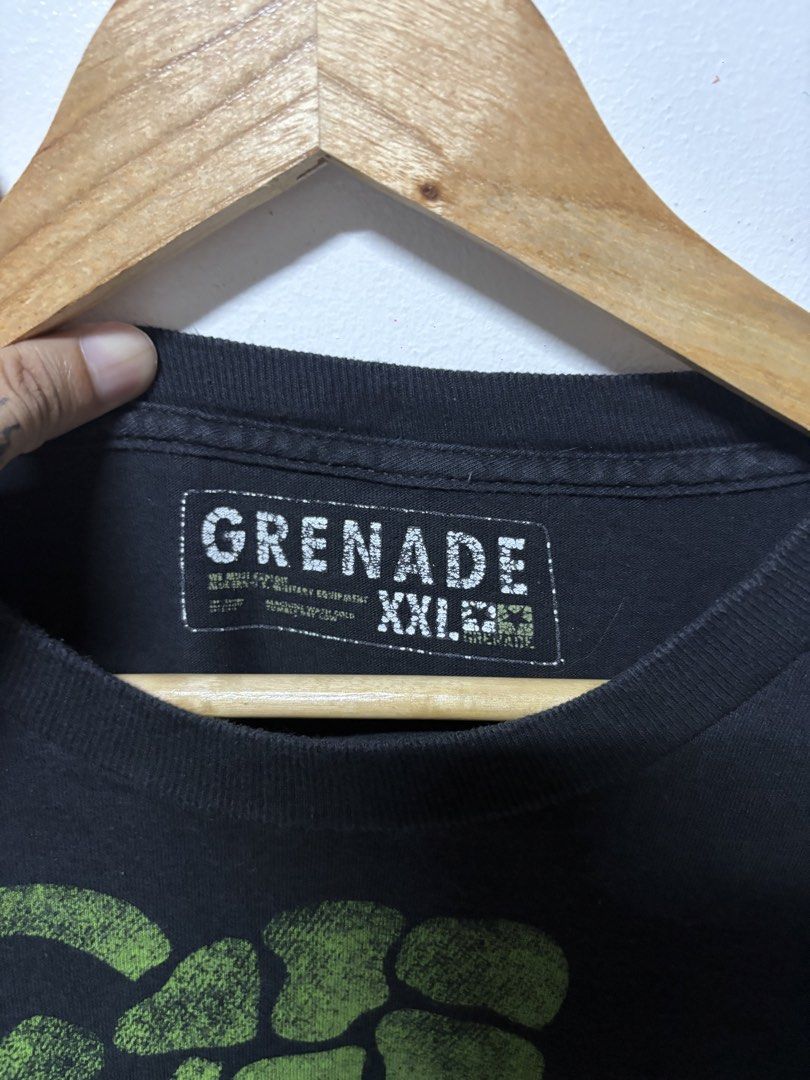 Grenade Skeleton Hand Grenade Graphic T-Shirt (Category: Tshirts & Polo Shirts ) located in Manila. Submitted by skeletal_v2 (Listing ID 1464719869, Image 3). Description: GRENADE (JESSE PINKMAN) 3500+SF 26/31 GOOD CONDITION COLOR RATE 9/10 - Brand: Grenade - Size: XXL (Relaxed fit) - Color: Black with green skeleton hand grenade graphic - Pop Culture: Famous piece worn by Jesse Pinkman in Breaking Bad - Condition: Minor fading on fabric, graphic