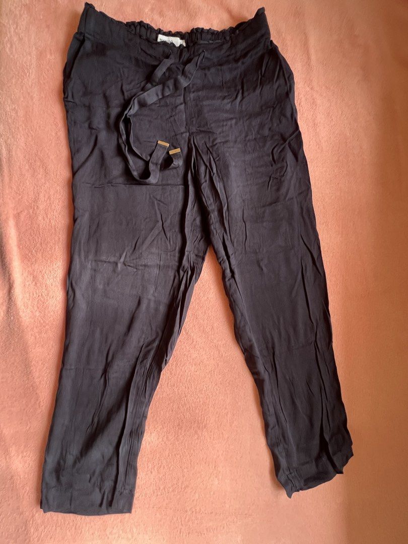Grey Cropped Pants with Tie Waist (Category: Jeans) located in Batangas. Submitted by alaisaampa7513 (Listing ID 1464570685, Image 1). Description: - Mango Basics grey pants - Cropped length - Tie waist detail - Elasticated waistband for comfort - Relaxed fit - Ideal for casual wear.