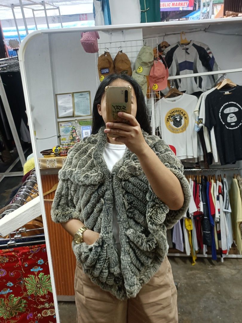 Grey fur shrug cropped jacket with pockets (Category: Coats, Jackets and Outerwear) located in Bayombong. Submitted by rheaaa00530 (Listing ID 1464707286, Image 1). Description: - Color: Neutral grey - Style: Open-front cropped jacket with short sleeves - Features: Super soft fluffy fur texture and convenient front pockets - Versatility: Easy layering piece that matches many outfits - Season: Perfect for cooler weather.