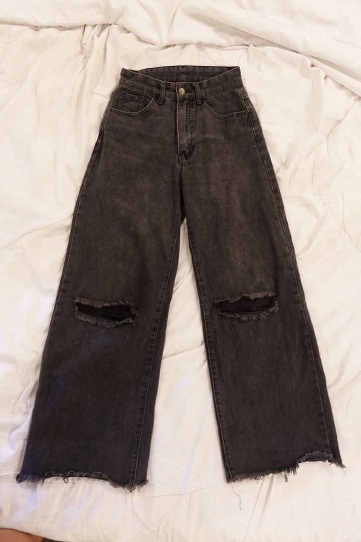 Grey Ripped Wide Leg Jeans (Category: Jeans) located in Pasig City. Submitted by hulyascloset (Listing ID 1464621904, Image 3). Description: - Grey wide leg jeans - Ripped details on the knees - Frayed hem - Button and zip closure - Front and back pockets - Comfortable fit - Ideal for casual wear RFS definitely now a medium.