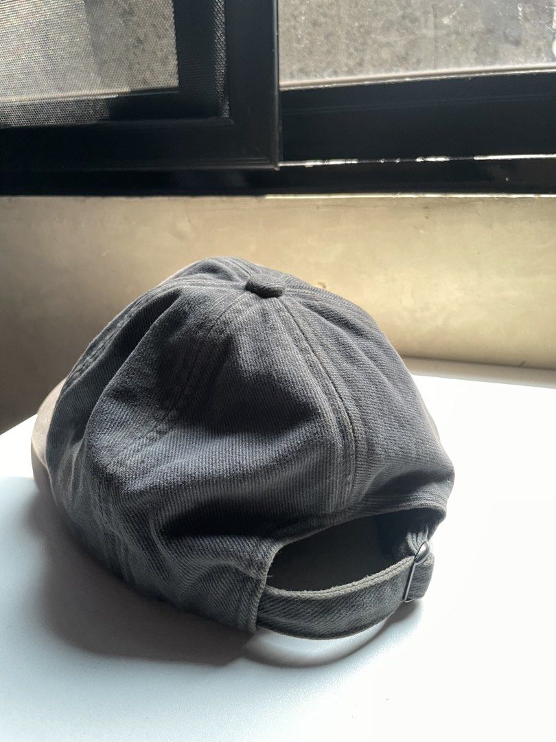GU charcoal gray twill cap (Category: Caps & Hats) located in Caloocan City. Submitted by iannacino (Listing ID 1464606775, Image 2). Description: GU charcoal gray twill cap color rate: 7/10 issue: discoloration/fade lines 180 +sf.