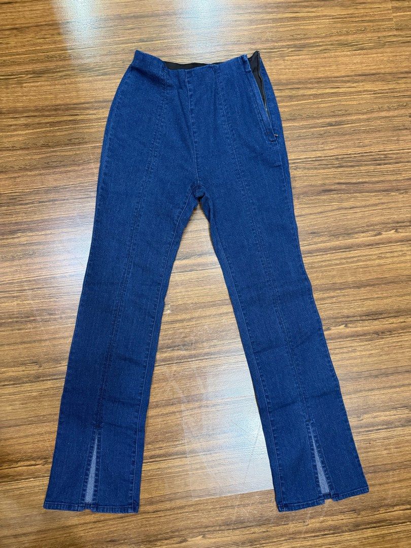 GU Dark Blue Split Hem Denim Pants Size S (Category: Jeans) located in Makati City. Submitted by melaitan (Listing ID 1464699444, Image 2). Description: - Brand: GU - Color: Dark Blue - Size: S (Brand new with tag attached) - Material: 77% cotton, 15% polyester, 7% rayon, 1% polyurethane - Design: Front split hem, visible center seams - Closure: Elastic waistband with side zipper.