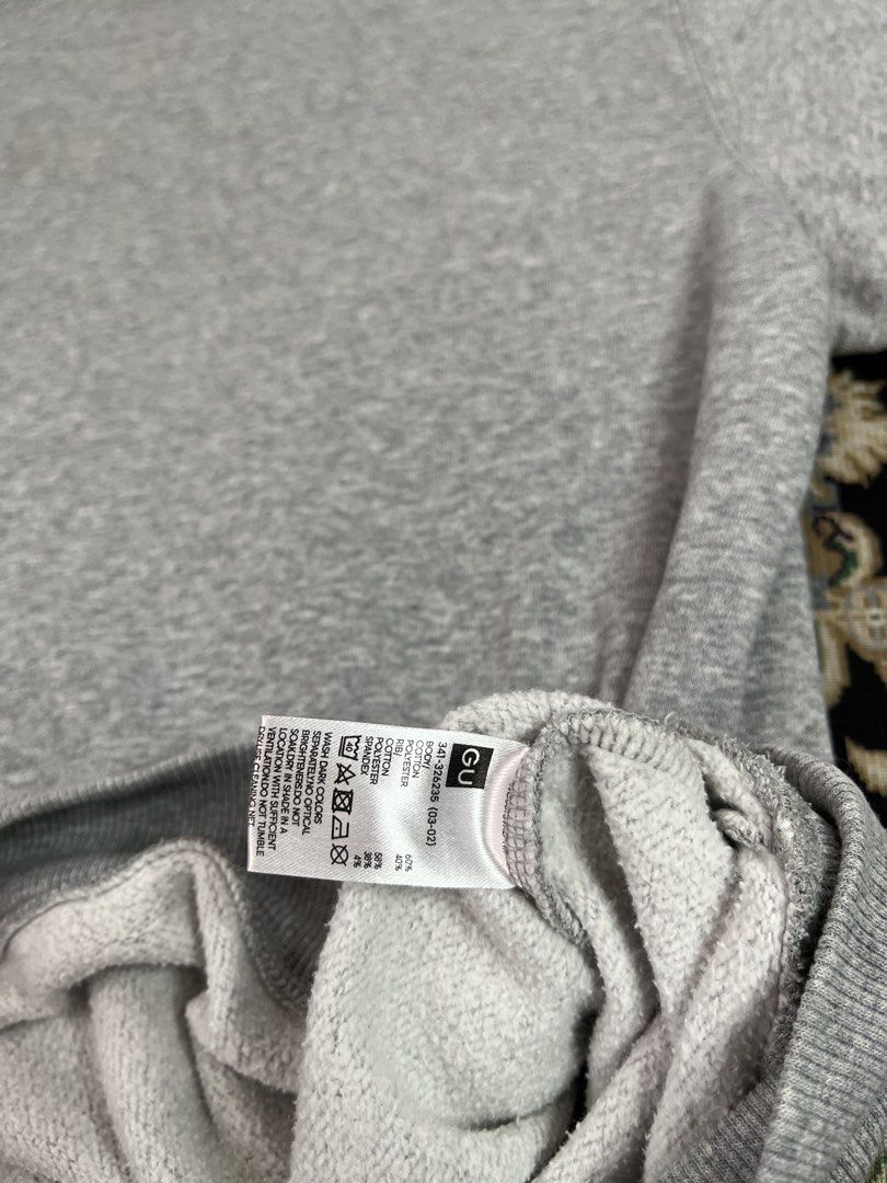GU SWEATER (Category: Coats, Jackets and Outerwear) located in Rizal. Submitted by 4twenthrift (Listing ID 1464693926, Image 2). Description: GU SWEATER Fits Large Width: 25 Length: 28 Condi: 9/10 Price: 799.