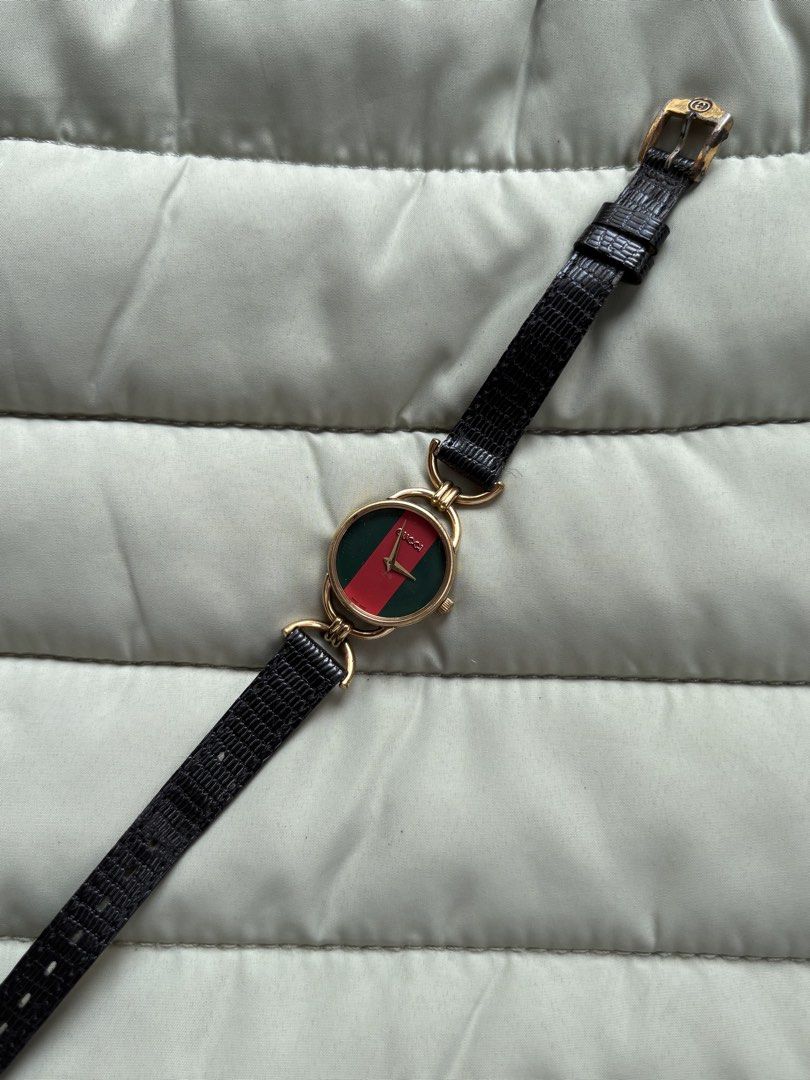 Gucci 2 6000L (Category: Luxury Watches) located in Macabebe. Submitted by _tiffanylopez (Listing ID 1464589317, Image 1). Description: Gucci 2 6000L 9/10 color sherry line.