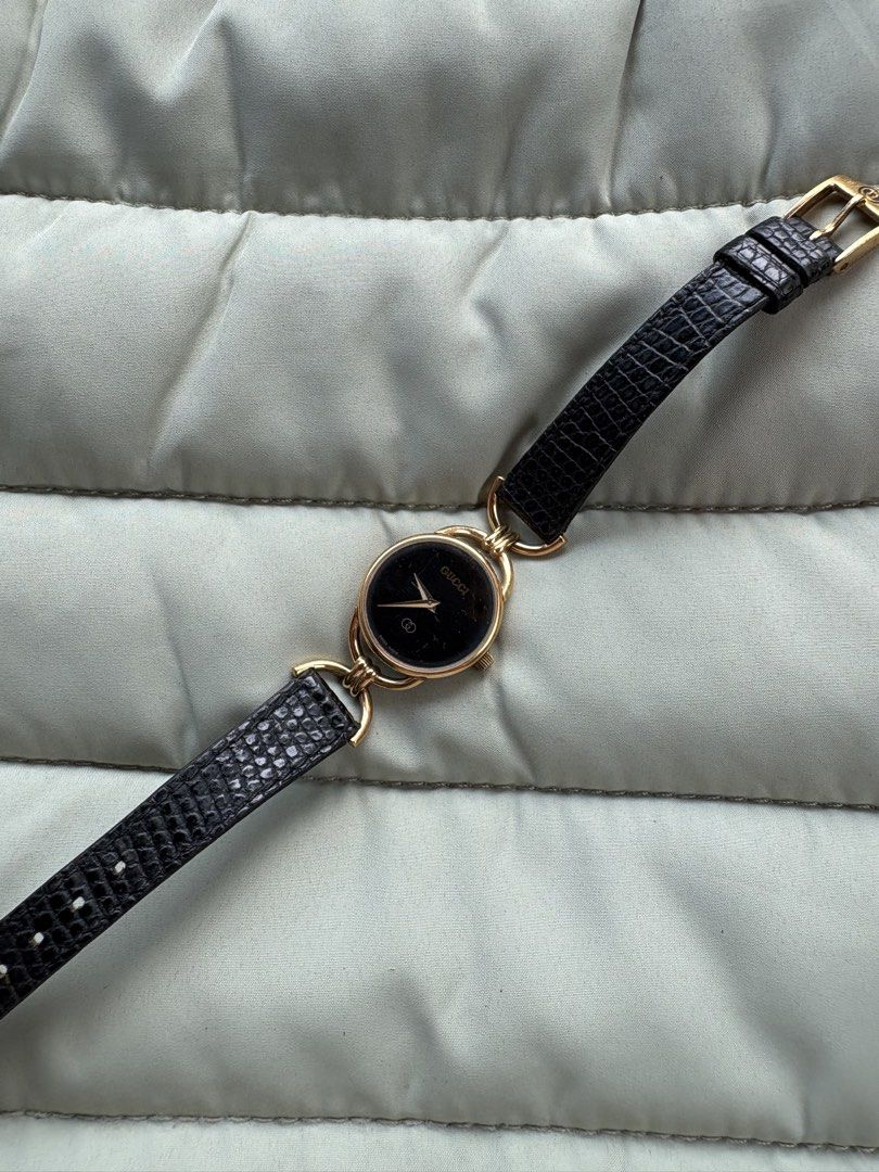 Gucci 6000L (Category: Luxury Watches) located in Macabebe. Submitted by _tiffanylopez (Listing ID 1464588891, Image 1). Description: Gucci 6000L 10/10 orig color GG logo black dial.