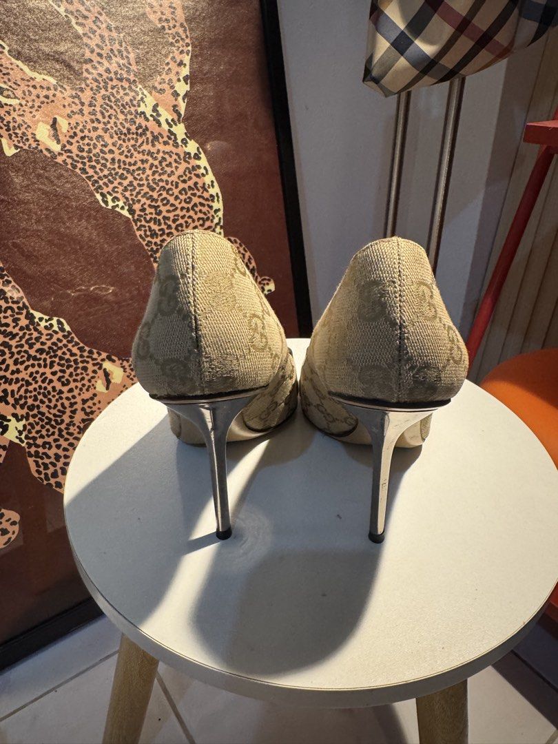 Gucci Canvas Horsebit Peep-Toe Heels (Category: Heels) located in Tuguegarao City. Submitted by shoppingaccgalore (Listing ID 1464634253, Image 3). Description: - Authentic Gucci canvas heels - Iconic horsebit detail - Peep-toe style - Size: 36 1/2 - Made in Italy - Classic, versatile design - Moderate heel height.