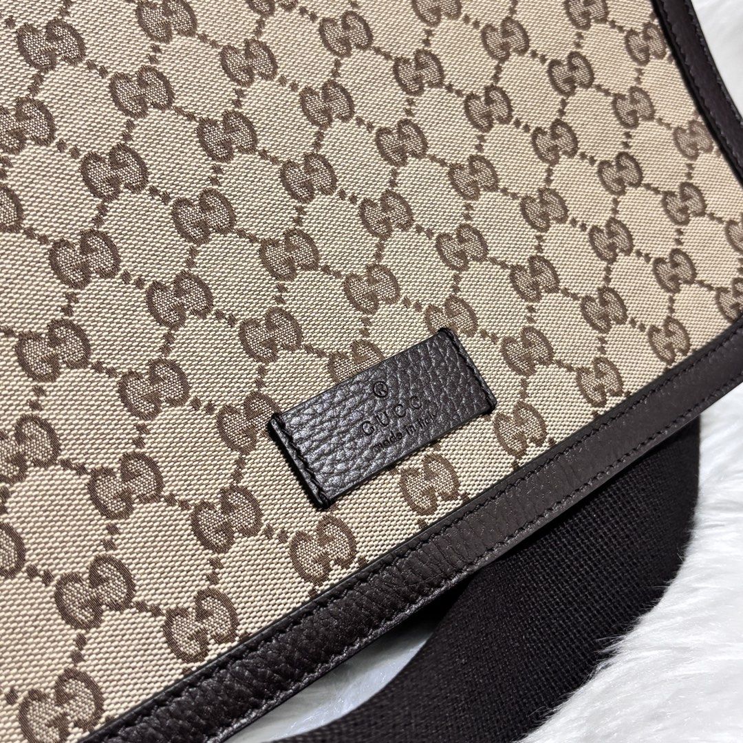 Gucci GG Canvas Flap Messenger Bag (Category: Luxury Bags & Wallets) located in Quezon City. Submitted by leens.preloved (Listing ID 1462629066, Image 2). Description: - Classic Gucci messenger bag - Iconic GG monogram pattern - Durable canvas with leather trim - Adjustable black strap - Ideal for everyday use - Price: PHP 37,000.