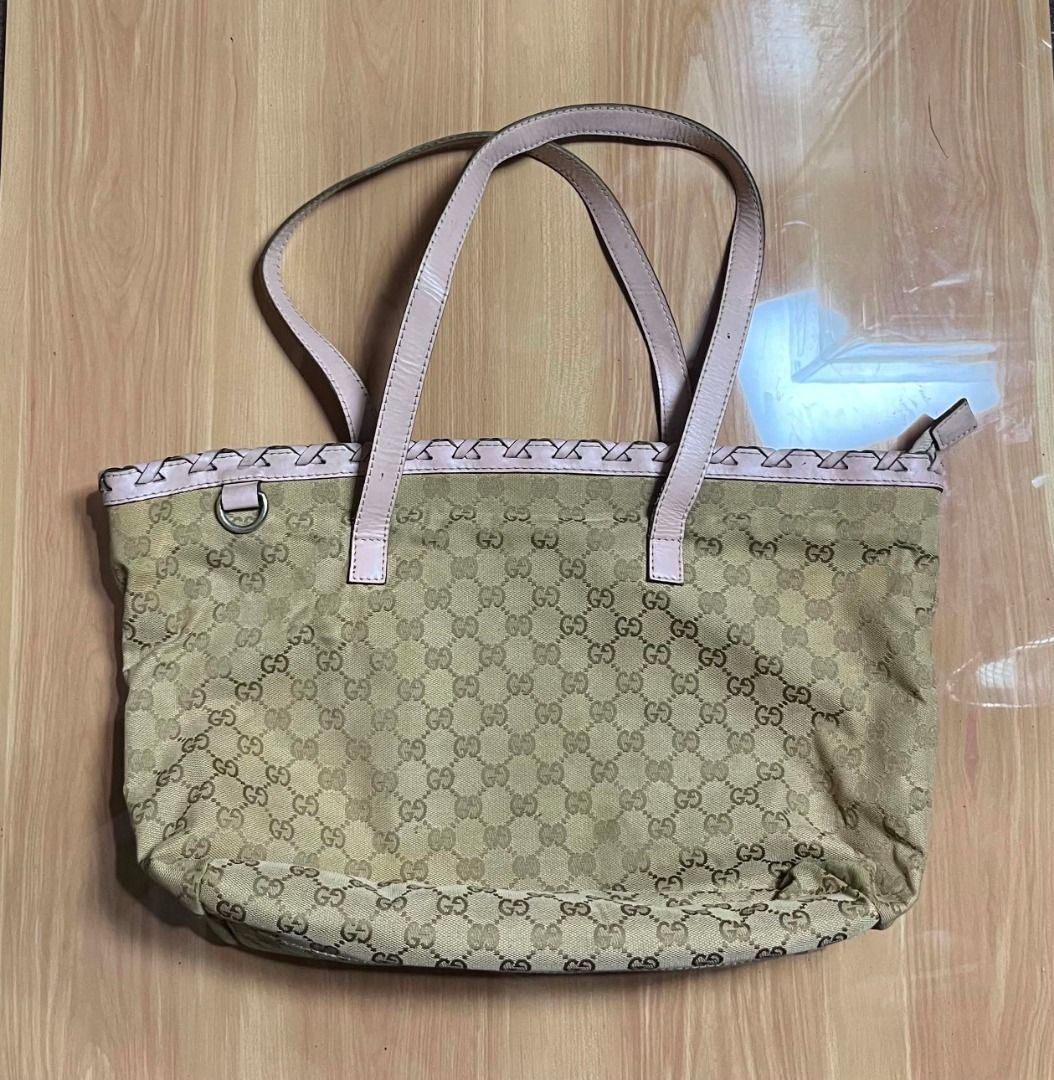Gucci GG Monogram Canvas Tote (Category: Tote Bags) located in Manila. Submitted by senggggg. (Listing ID 1464706917, Image 1). Description: good condition working zip minimal sign of use.