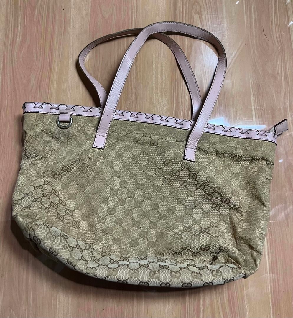 Gucci GG Monogram Canvas Tote (Category: Tote Bags) located in Manila. Submitted by senggggg. (Listing ID 1464706917, Image 2). Description: good condition working zip minimal sign of use.