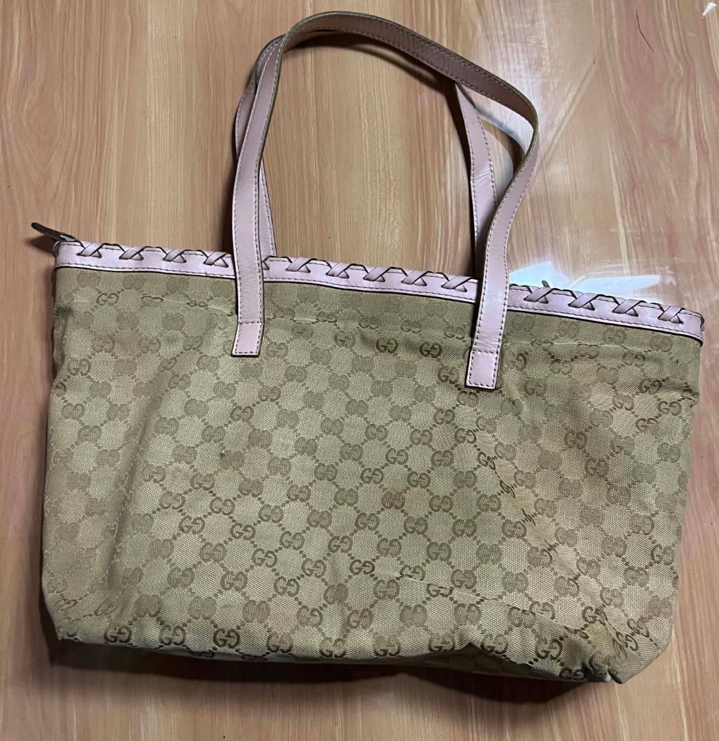 Gucci GG Monogram Canvas Tote (Category: Tote Bags) located in Manila. Submitted by senggggg. (Listing ID 1464706917, Image 3). Description: good condition working zip minimal sign of use.