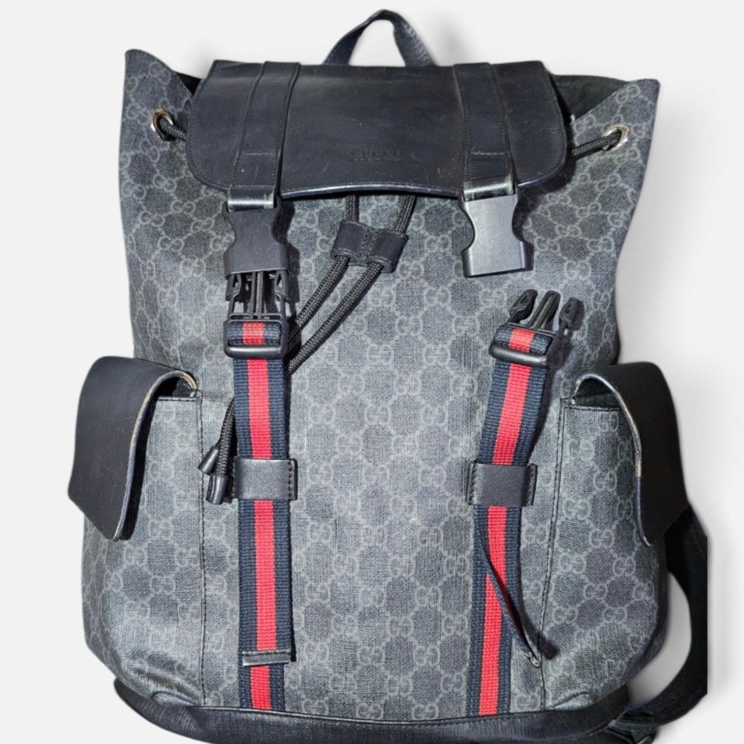 Gucci GG Supreme Monogram Messenger Bag (Category: Luxury Bags & Wallets) located in Kibawe. Submitted by Thrift_ni_Babac (Listing ID 1464633364, Image 1). Description: - Gucci Messenger Bag - Iconic GG Supreme Monogram Canvas - Black Leather Trim and Straps - Red and Blue Stripe Detail - Interior Tags with Serial Numbers: 495563 201016 and 50833 - Made in Italy - Ideal for Everyday Use Rubs on corner.