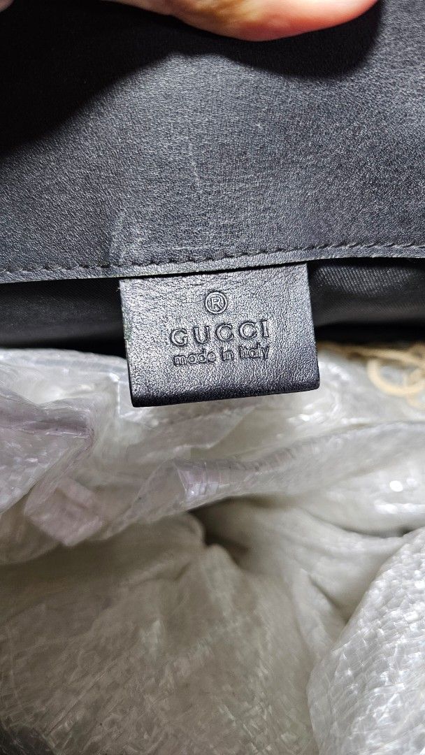 Gucci GG Supreme Monogram Messenger Bag (Category: Luxury Bags & Wallets) located in Kibawe. Submitted by Thrift_ni_Babac (Listing ID 1464633364, Image 2). Description: - Gucci Messenger Bag - Iconic GG Supreme Monogram Canvas - Black Leather Trim and Straps - Red and Blue Stripe Detail - Interior Tags with Serial Numbers: 495563 201016 and 50833 - Made in Italy - Ideal for Everyday Use Rubs on corner.