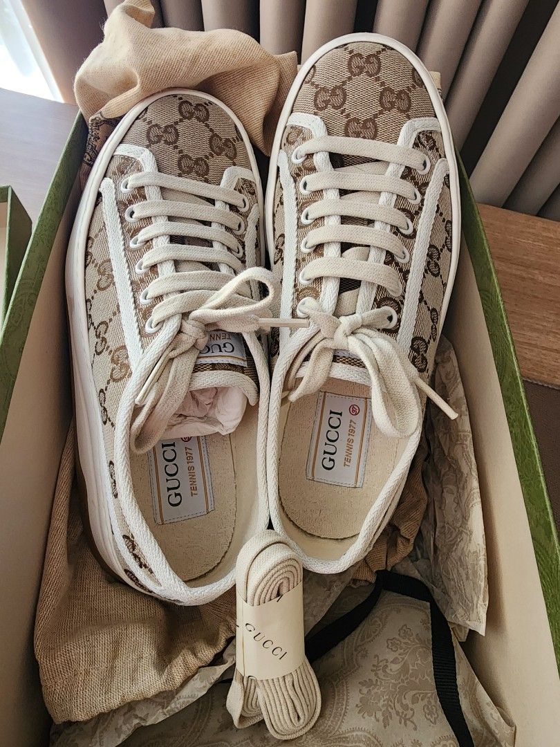 Authentic Gucci Sneakers (Category: Sneakers) located in Taguig. Submitted by marialaurice (Listing ID 1464739065, Image 1). Description: - Authentic Gucci sneakers in classic beige GG canvas - Like new, rarely used, strictly kept inside the box - Complete inclusions: extra laces, original dust bags, green box, and store receipt - Perfect statement piece for casual wear or streetwear styling.