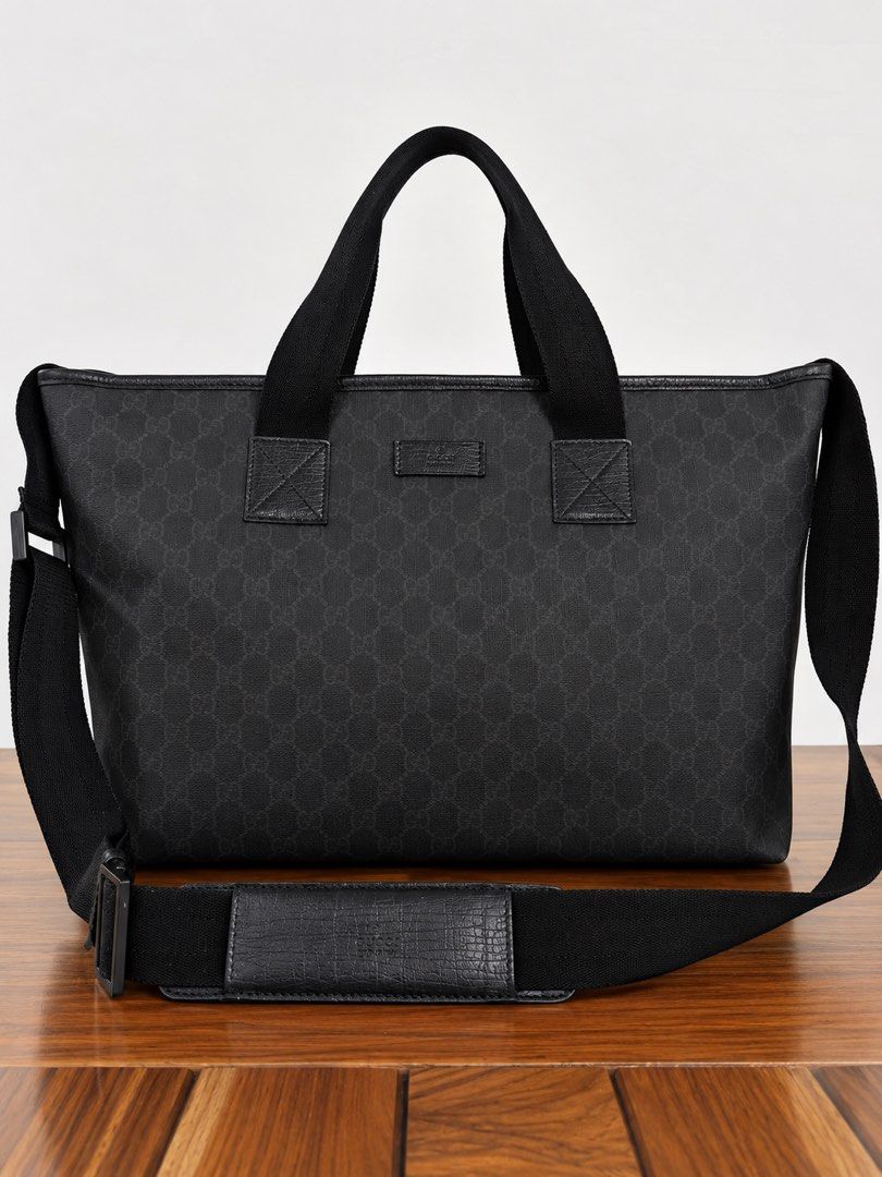 Gucci Tote GG Monogram (Category: Luxury Bags & Wallets) located in Paranaque City. Submitted by katlouieleandicho (Listing ID 1464594428, Image 2). Description: 💯Authentic Made in Italy Dimensions : W 20.5 in x H 12in x D 6.5in Gucci Black GG Canvas Tote Bag Classic Gucci tote in black GG monogram canvas with tonal leather detailing and sturdy webbing handles. Features a detachable adjustable shoulder strap with padded leather shoulder section,