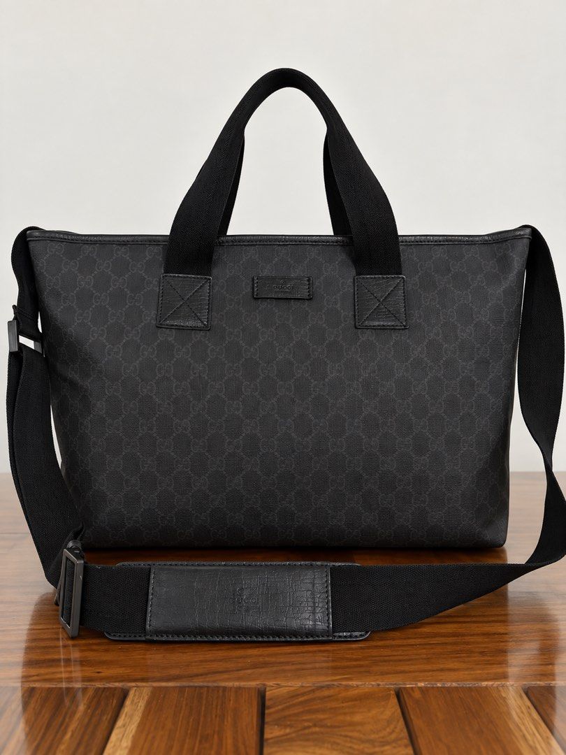 Gucci Tote GG Monogram (Category: Luxury Bags & Wallets) located in Paranaque City. Submitted by katlouieleandicho (Listing ID 1464594428, Image 1). Description: 💯Authentic Made in Italy Dimensions : W 20.5 in x H 12in x D 6.5in Gucci Black GG Canvas Tote Bag Classic Gucci tote in black GG monogram canvas with tonal leather detailing and sturdy webbing handles. Features a detachable adjustable shoulder strap with padded leather shoulder section,