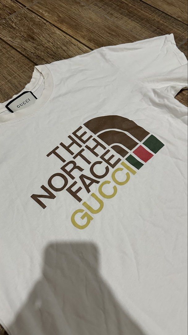 GUCCI X THE NORTH FACE (Category: Tshirts & Polo Shirts ) located in Manila. Submitted by urban.vintage (Listing ID 1464702991, Image 2). Description: ISSUEs:NONE (NEED WASH) MOP :GCASH (NO COD) SHIP VIA: LALAMOVE & J&T LOCATION: PASIG CITY LENGTH: 26 WIDTH :22.