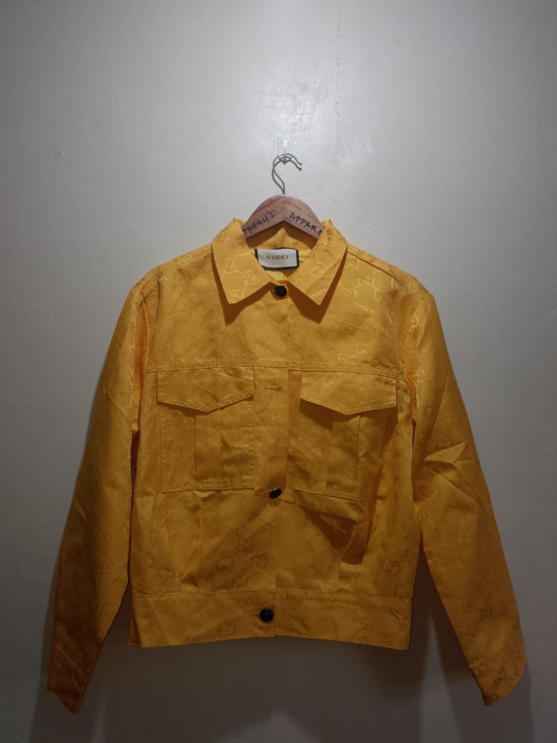 Gucci Yellow Monogram Jacket (Category: Coats, Jackets and Outerwear) located in Manila. Submitted by bengluxury (Listing ID 1464579533, Image 1). Description: - Authentic yellow Gucci jacket - All-over GG monogram pattern - Button-up front closure - Two front pockets with button closure - Perfect statement piece for any outfit.