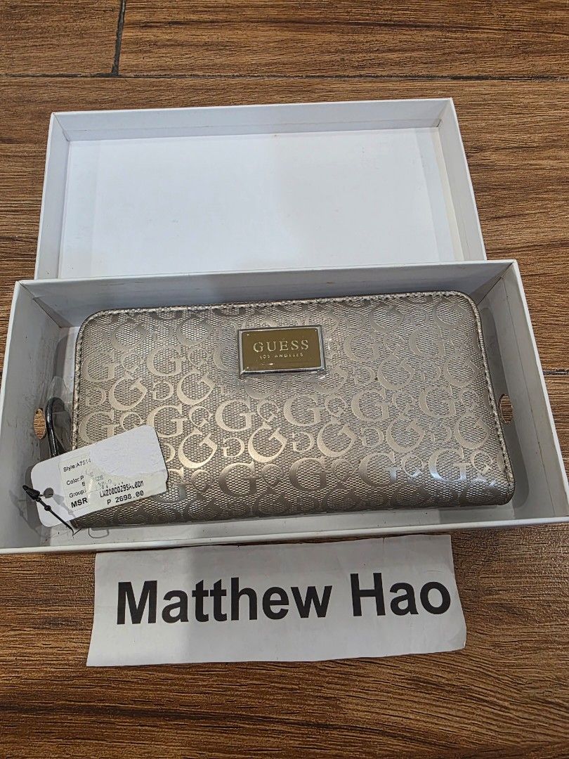 Guess wallet (Category: Wallets & Card holders) located in Manila. Submitted by machoxmatt (Listing ID 1464614552, Image 1). Description: brandnew mop:bdo/gcash shipping at buyer's expense.