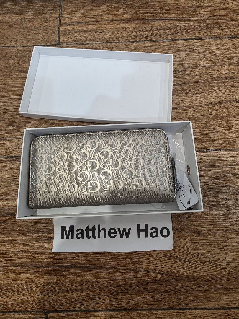 Guess wallet (Category: Wallets & Card holders) located in Manila. Submitted by machoxmatt (Listing ID 1464614552, Image 2). Description: brandnew mop:bdo/gcash shipping at buyer's expense.