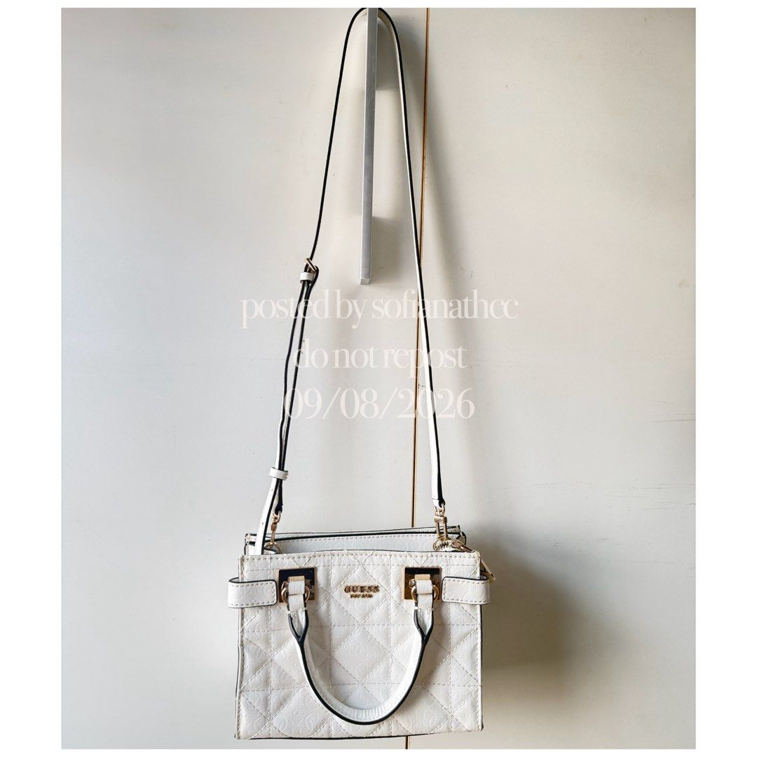 Guess White with Gold hardware Top Handle Bag with Shoulder Strap (Category: Shoulder Bags) located in Manila. Submitted by sofianathcc (Listing ID 1464631063, Image 1). Description: - White Guess handbag/crossbody bag - Quilted pattern - Gold hardware - Top handle - Detachable shoulder strap - Multiple interior compartments - Clean inside and out - Perfect for everyday or special occasions - bought for 5k in store - RFS: decluttering Price still