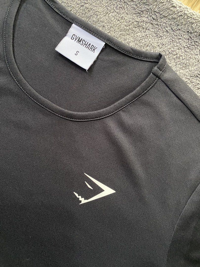 Gymshark Training Shirt (Category: Activewear) located in Cebu City. Submitted by markvoid (Listing ID 1464698793, Image 2). Description: Gymshark Training Shirt >Excellent Condition >Like New >No Flaws >Color Rate: 10/10 >Color May Vary Due To Light >Width: 18 >length: 23 >Size: Small >Price+SF >MOP: Gcash/Bank Transfer >Shipping: J&T Mandaue City.
