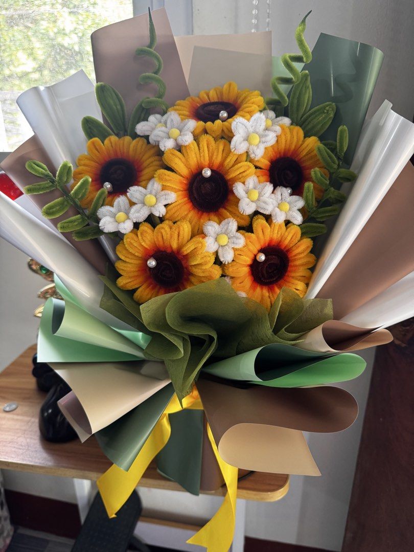 Handmade Sunflower and Daisy Bouquet (Category: Flowers & Bouquets) located in Batangas. Submitted by ems10. (Listing ID 1464595662, Image 1). Description: - Beautiful handmade bouquet featuring sunflowers and daisies. - Crafted with care and attention to detail. - Wrapped in decorative paper and ribbons. - Makes a lovely gift or decoration. - Perfect for birthdays, anniversaries, or just because. - Unique and charming..