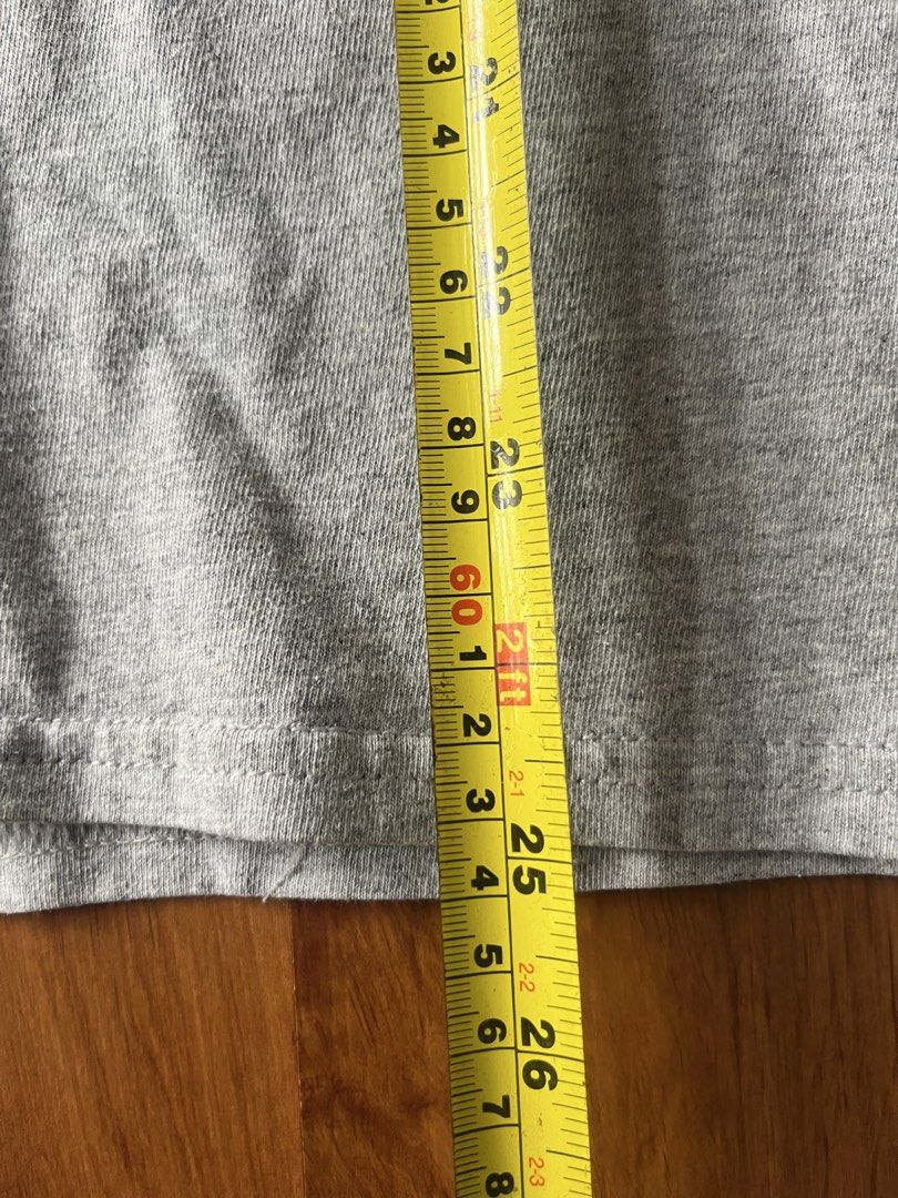 Hanes Vintage Plain Heather Grey Long Sleeve Tee (Category: Tshirts & Polo Shirts ) located in Lipa City. Submitted by alexcollectionco (Listing ID 1464724067, Image 3). Description: Essential solid heather grey long-sleeve shirt from Hanes. Features a classic crew neck, ribbed sleeve cuffs, and a soft, lightweight cotton-blend build. Ideal for layering, minimalist everyday wear, or styling with Y2K / vintage aesthetic fits. Measurements & Fit: •