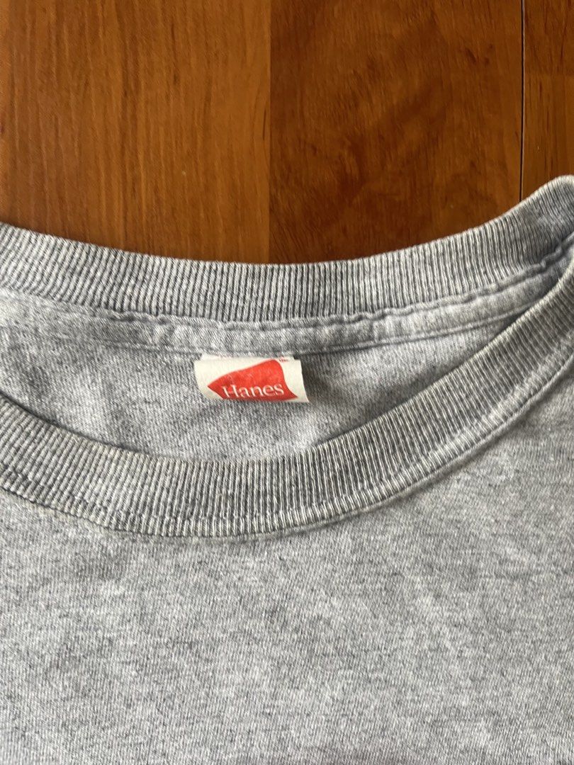 Hanes Vintage Plain Heather Grey Long Sleeve Tee (Category: Tshirts & Polo Shirts ) located in Lipa City. Submitted by alexcollectionco (Listing ID 1464724067, Image 2). Description: Essential solid heather grey long-sleeve shirt from Hanes. Features a classic crew neck, ribbed sleeve cuffs, and a soft, lightweight cotton-blend build. Ideal for layering, minimalist everyday wear, or styling with Y2K / vintage aesthetic fits. Measurements & Fit: •