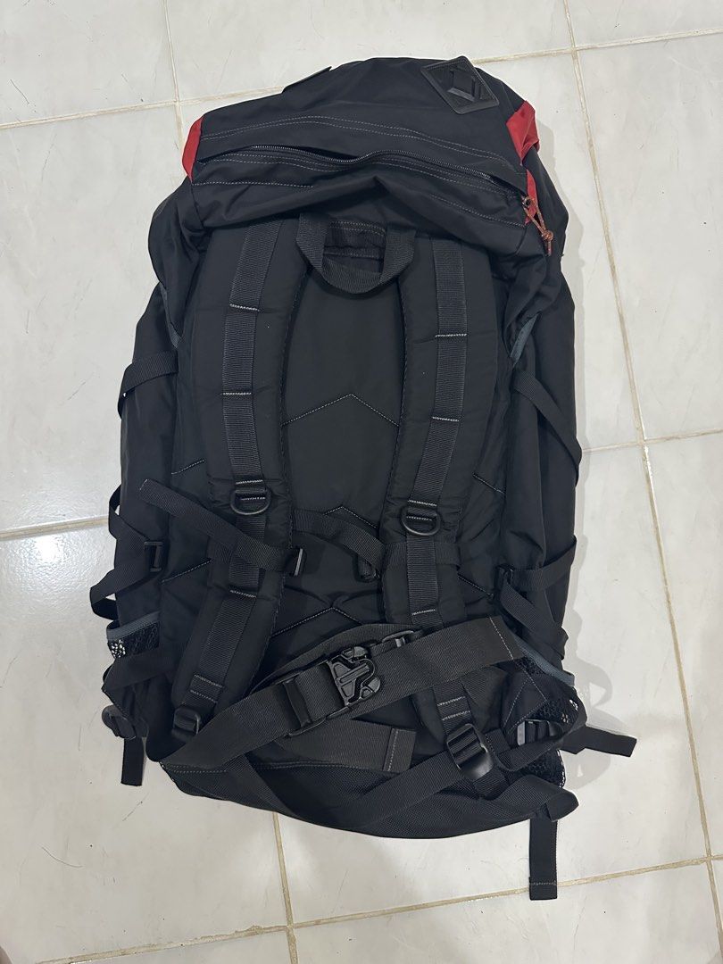 Hanuman Black Hiking Backpack 60L (Category: Backpacks) located in Baguio. Submitted by surplusbaguio.shop (Listing ID 1464622971, Image 2). Description: - Durable black hiking backpack - Eye-catching red front pocket - Multiple straps and buckles for secure gear attachment - Convenient side mesh pockets for water bottles or quick access items - Ample interior space for all your essentials - Ideal for camping, trekking, or travel - Ready for your
