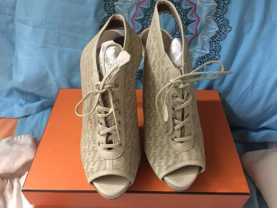 Hermès Peep-Toe Lace-Up Slingback Booties (Category: Heels) located in San Juan City. Submitted by erikacastanedaaaa27 (Listing ID 1464746668, Image 1). Description: NEGOTIABLE! Details: • Brand: Hermès • Color: Beige / Ecru • Material: Canvas & Leather • Style: Peep-toe lace-up slingback booties • Heel: High stiletto • Made in Italy Condition: Excellent condition. Only used once for a party. Comes with original box, original dust bag, and origin