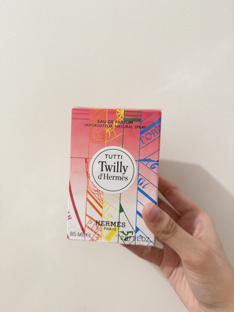Hermès Tutti Twilly d'Hermès Eau de Parfum 85ml (Category: Fragrance & Deodorants) located in Manila. Submitted by ktyyycloset (Listing ID 1464720643, Image 1). Description: - Authentic Hermès Tutti Twilly d'Hermès Eau de Parfum - Bottle Size: 85ml (Full size) - Condition: Brand new - Packaging: Complete with original colorful box -100% authentic -PS: photo of the bottle is my personal use Rfs: extra stock -Negotiable.