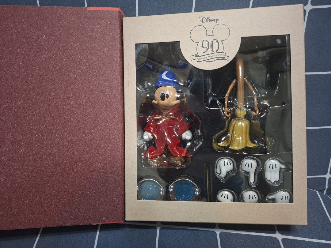 Herocross Disney 90th Sorcerer Mickey with Magic Broom (Category: Figurines & Statues) located in Mandaluyong City. Submitted by elitecollections (Listing ID 1464649749, Image 2). Description: for salebrandnew -Herocross Disney 90th Anniversary Sorcerer Mickey Figurine - Hybrid Metal construction - Includes magic broom accessory - Features a unique film strip design packaging showcasing Mickey in action - Perfect collectible for Disney enthusiast