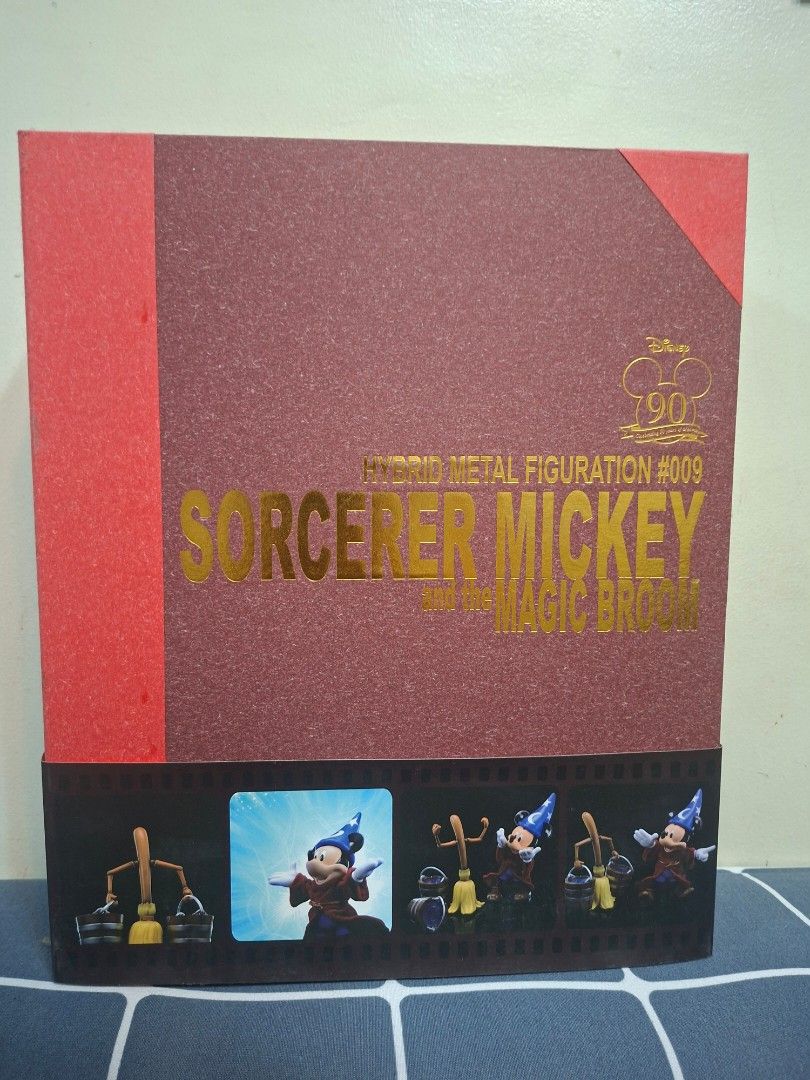 Herocross Disney 90th Sorcerer Mickey with Magic Broom (Category: Figurines & Statues) located in Mandaluyong City. Submitted by elitecollections (Listing ID 1464649749, Image 1). Description: for salebrandnew -Herocross Disney 90th Anniversary Sorcerer Mickey Figurine - Hybrid Metal construction - Includes magic broom accessory - Features a unique film strip design packaging showcasing Mickey in action - Perfect collectible for Disney enthusiast