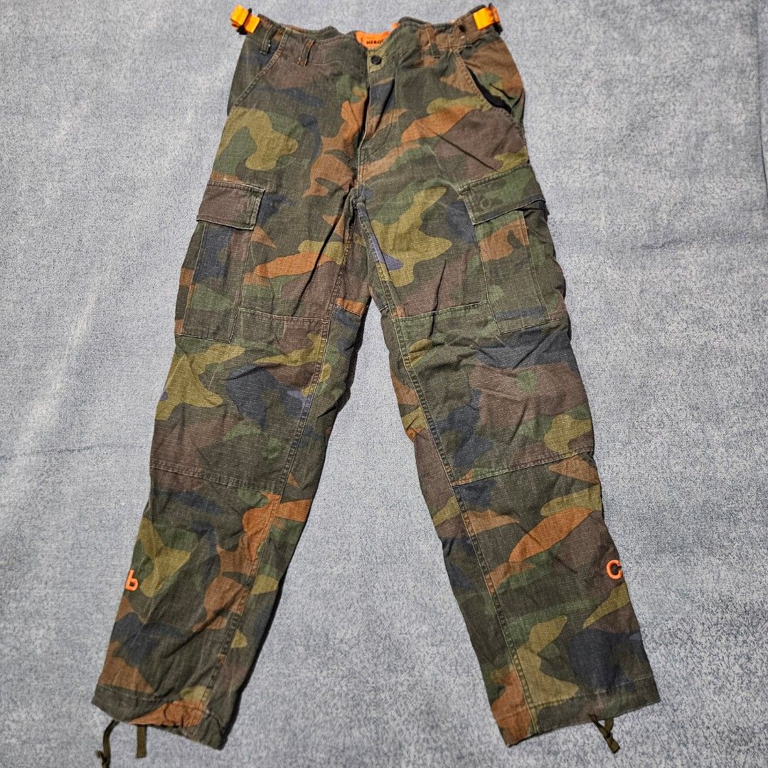 Heron preston utility cargo pants (Category: Trousers) located in Baguio. Submitted by fadexquisite (Listing ID 1464698192, Image 1). Description: Heron preston utility cargo pants Size med on tag Waist 30inch Length 38inch Rise 12inch Inseam 28inch Leg opening 7inch Excellent condition 1300 plus ship fee.