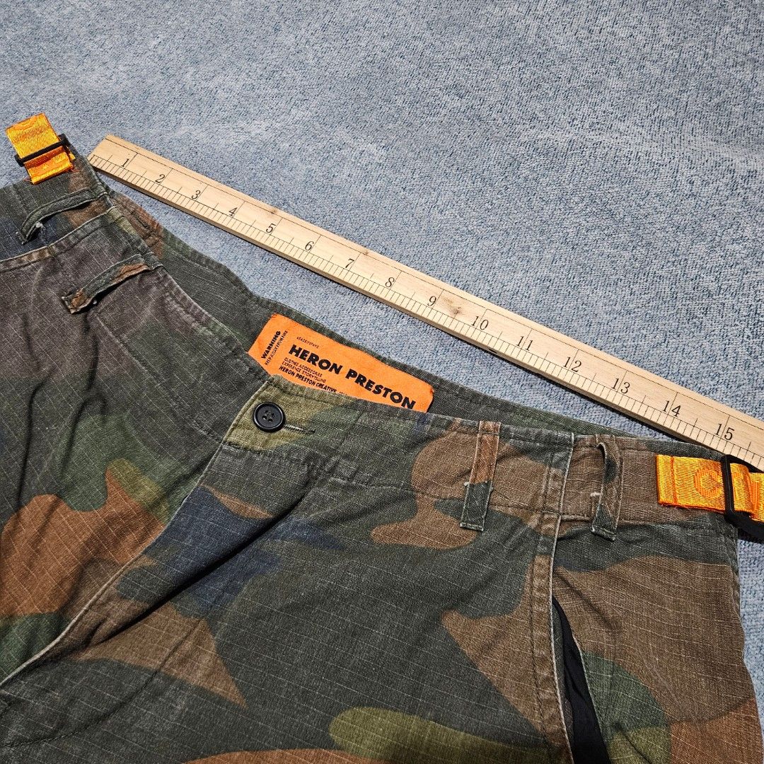 Heron preston utility cargo pants (Category: Trousers) located in Baguio. Submitted by fadexquisite (Listing ID 1464698192, Image 3). Description: Heron preston utility cargo pants Size med on tag Waist 30inch Length 38inch Rise 12inch Inseam 28inch Leg opening 7inch Excellent condition 1300 plus ship fee.
